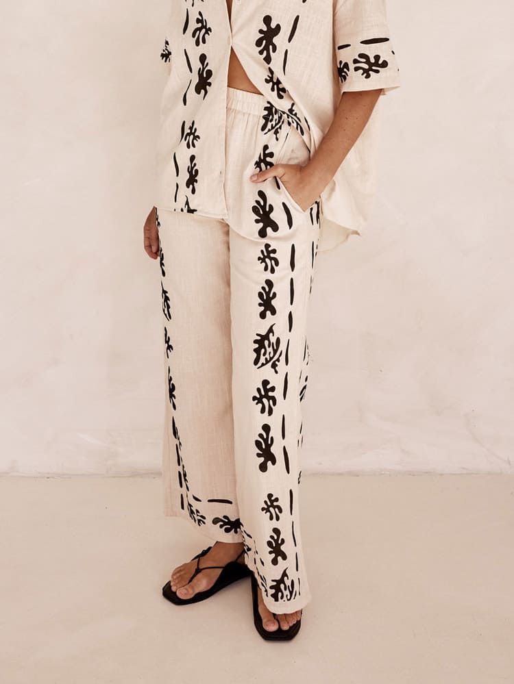 Set of Cream Wide Leg Trousers with Black Print