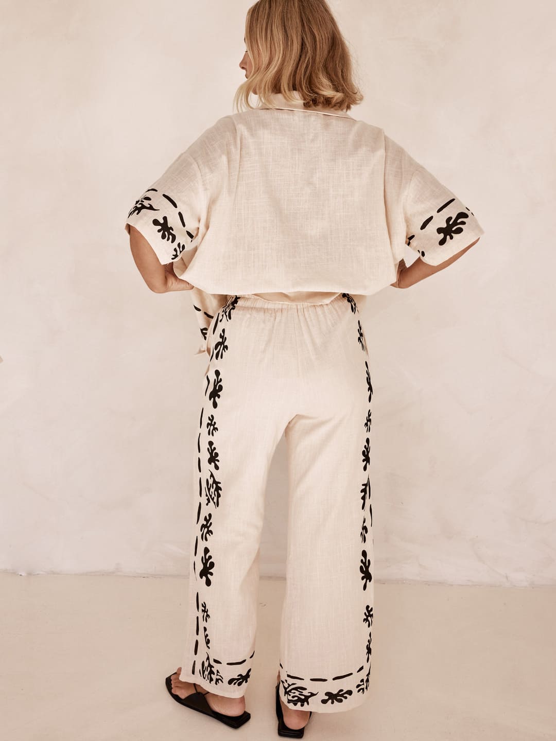 Set of Cream Wide Leg Trousers with Black Print
