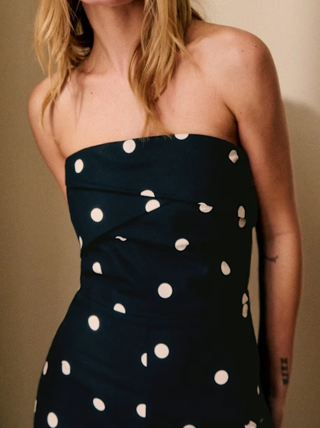 Ecru Polka Dot Jumpsuit on Black Background