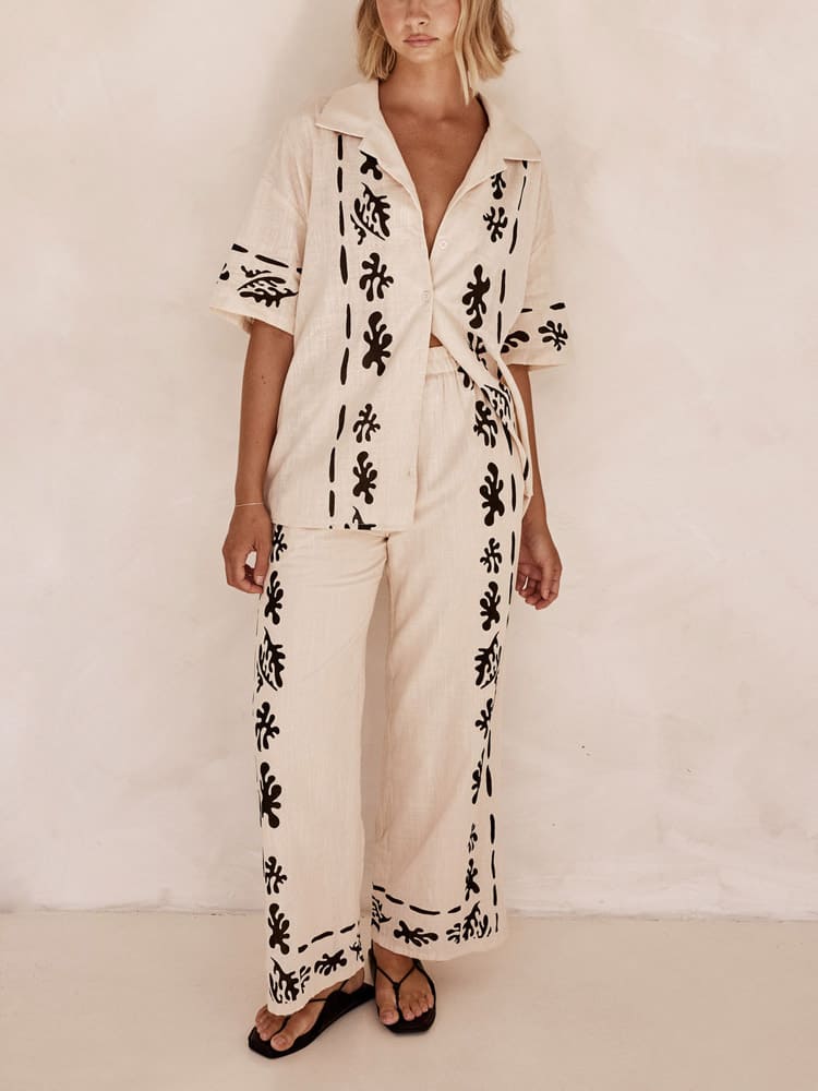 Set of Cream Wide Leg Trousers with Black Print