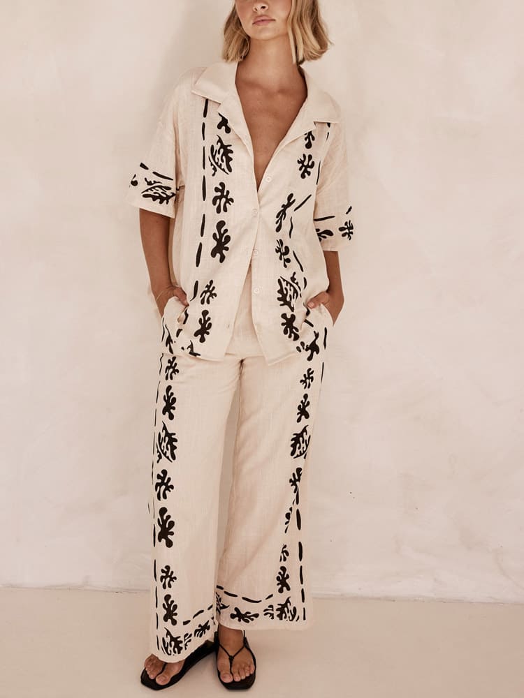 Set of Cream Wide Leg Trousers with Black Print