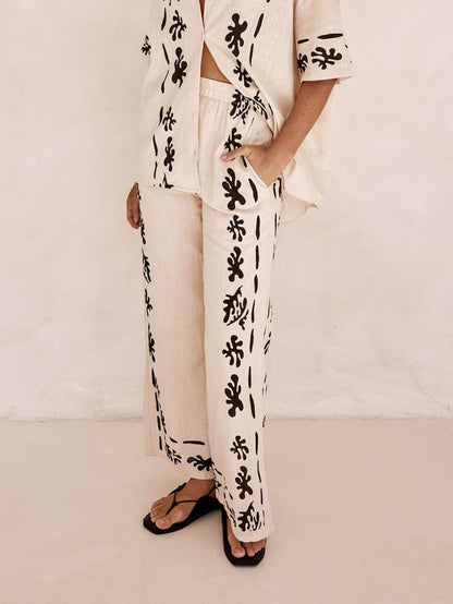 Set of Cream Wide Leg Trousers with Black Print