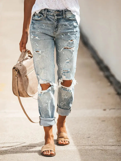 Distinctive Distressed Cropped Denim Pants with Paint Splatter Design