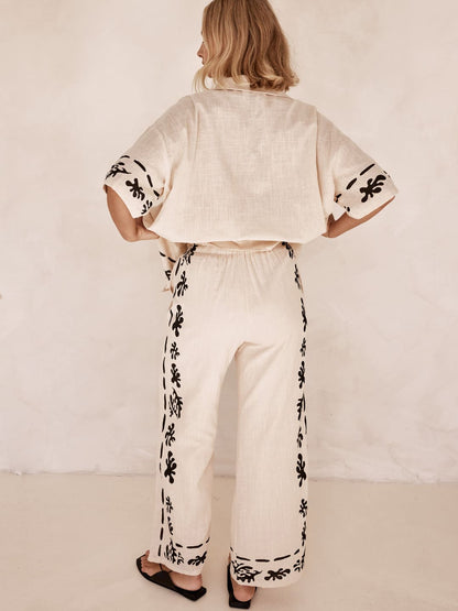 Set of Cream Wide Leg Trousers with Black Print
