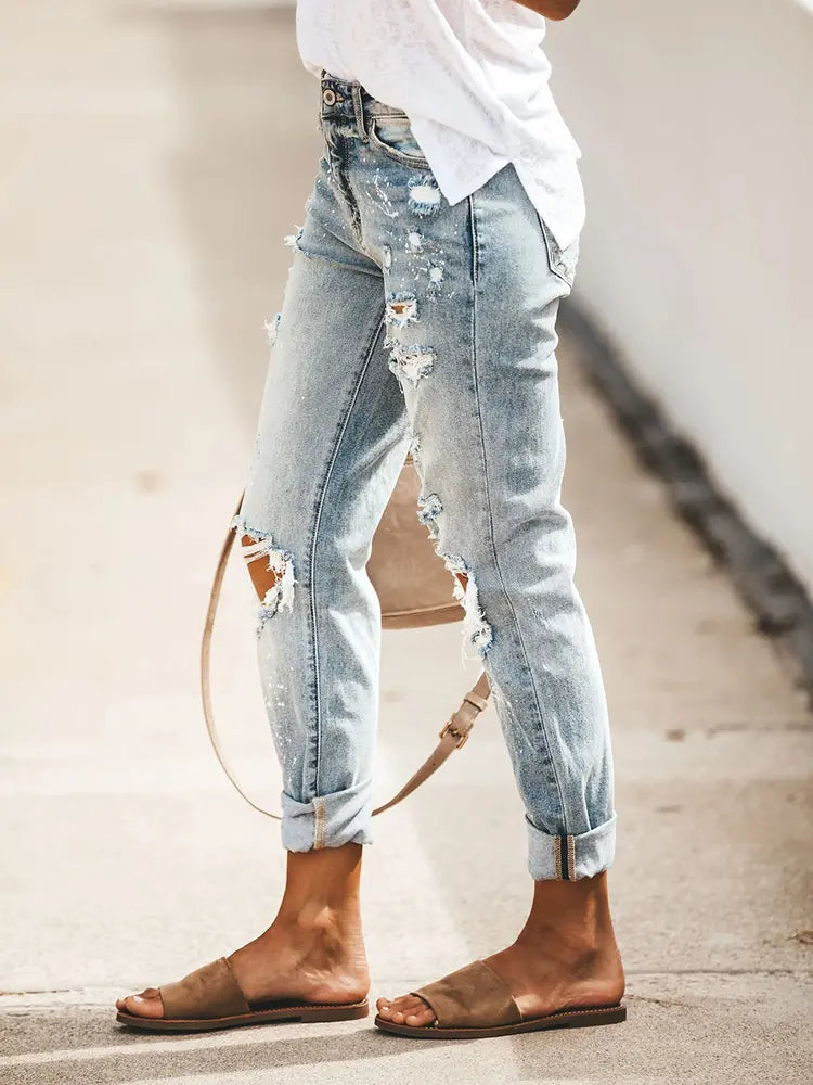 Distinctive Distressed Cropped Denim Pants with Paint Splatter Design