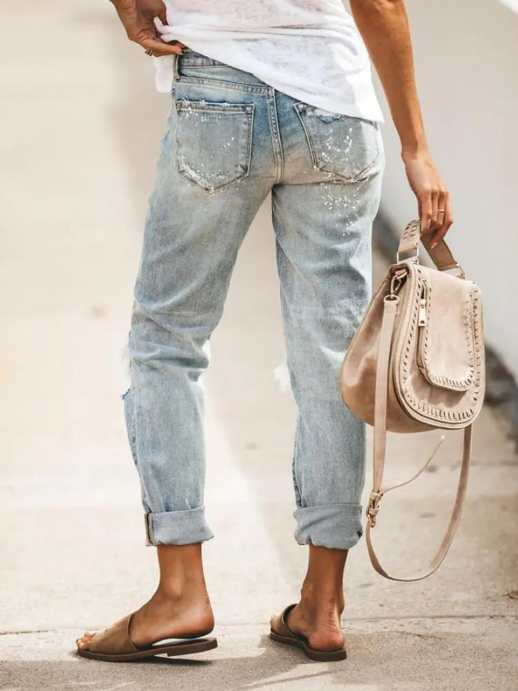 Distinctive Distressed Cropped Denim Pants with Paint Splatter Design