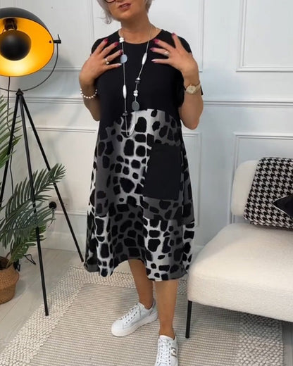 - Casandra Abstract Midi Dress